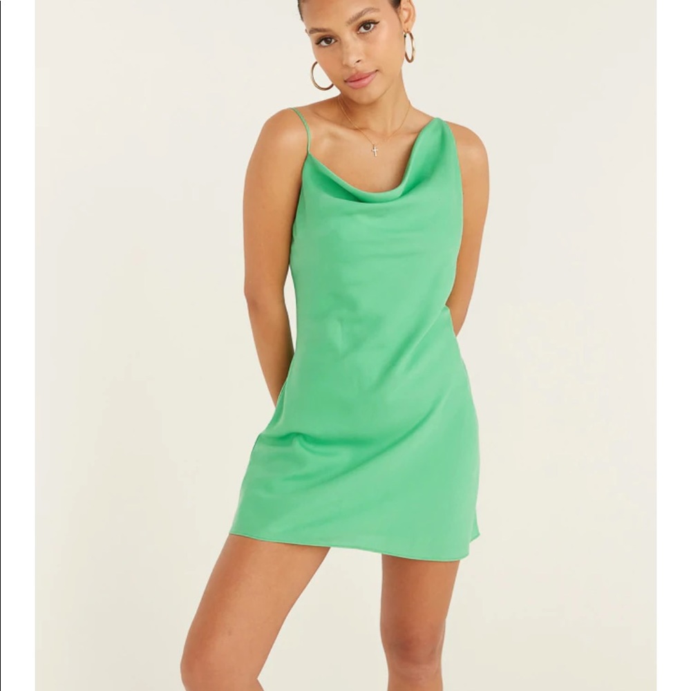 Green dress! Very flattering on. Too small for me.